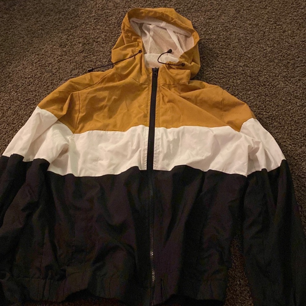 yellow, white & black windbreaker